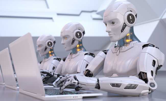 Three white humanoid-robots sitting side-by side, working on their laptops